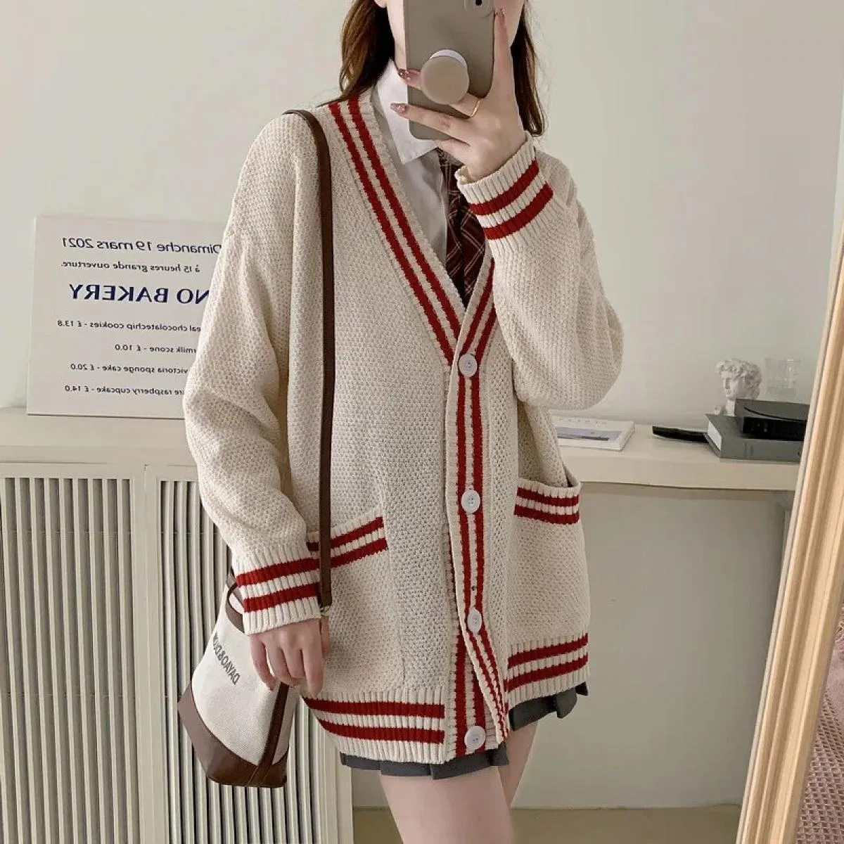 2023 Cardigan lavorato a maglia con scollo a V color primavera autunno 2023 Maglione maglione allentato delicato da donna