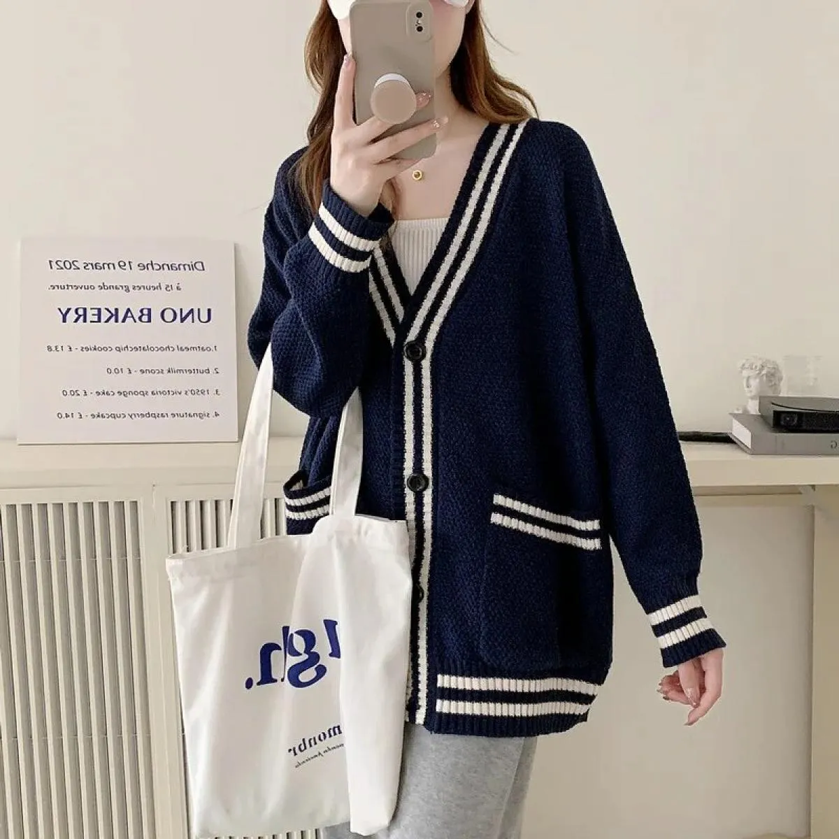 2023 Cardigan lavorato a maglia con scollo a V color primavera autunno 2023 Maglione maglione allentato delicato da donna