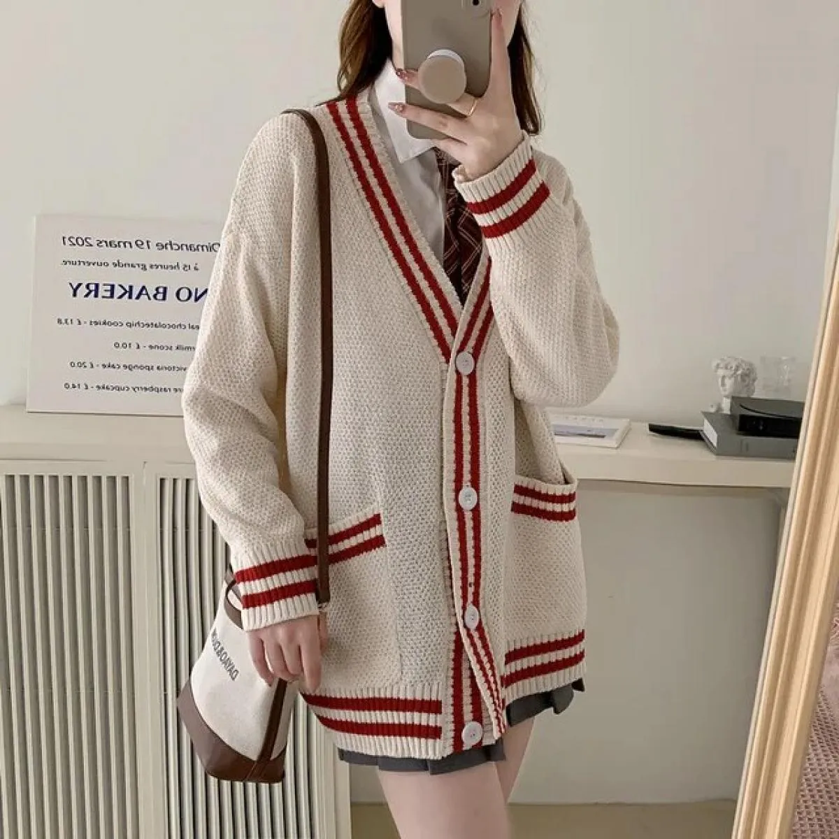 2023 Cardigan lavorato a maglia con scollo a V color primavera autunno 2023 Maglione maglione allentato delicato da donna