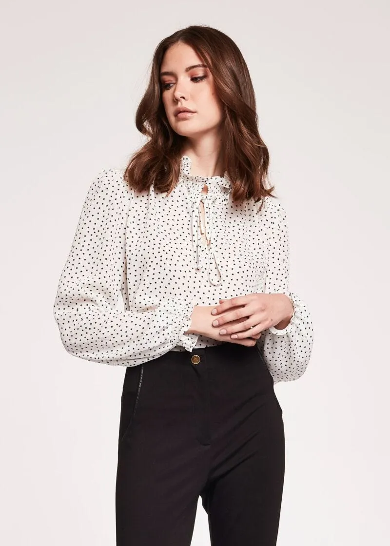 Blusa con maniche a sbuffo