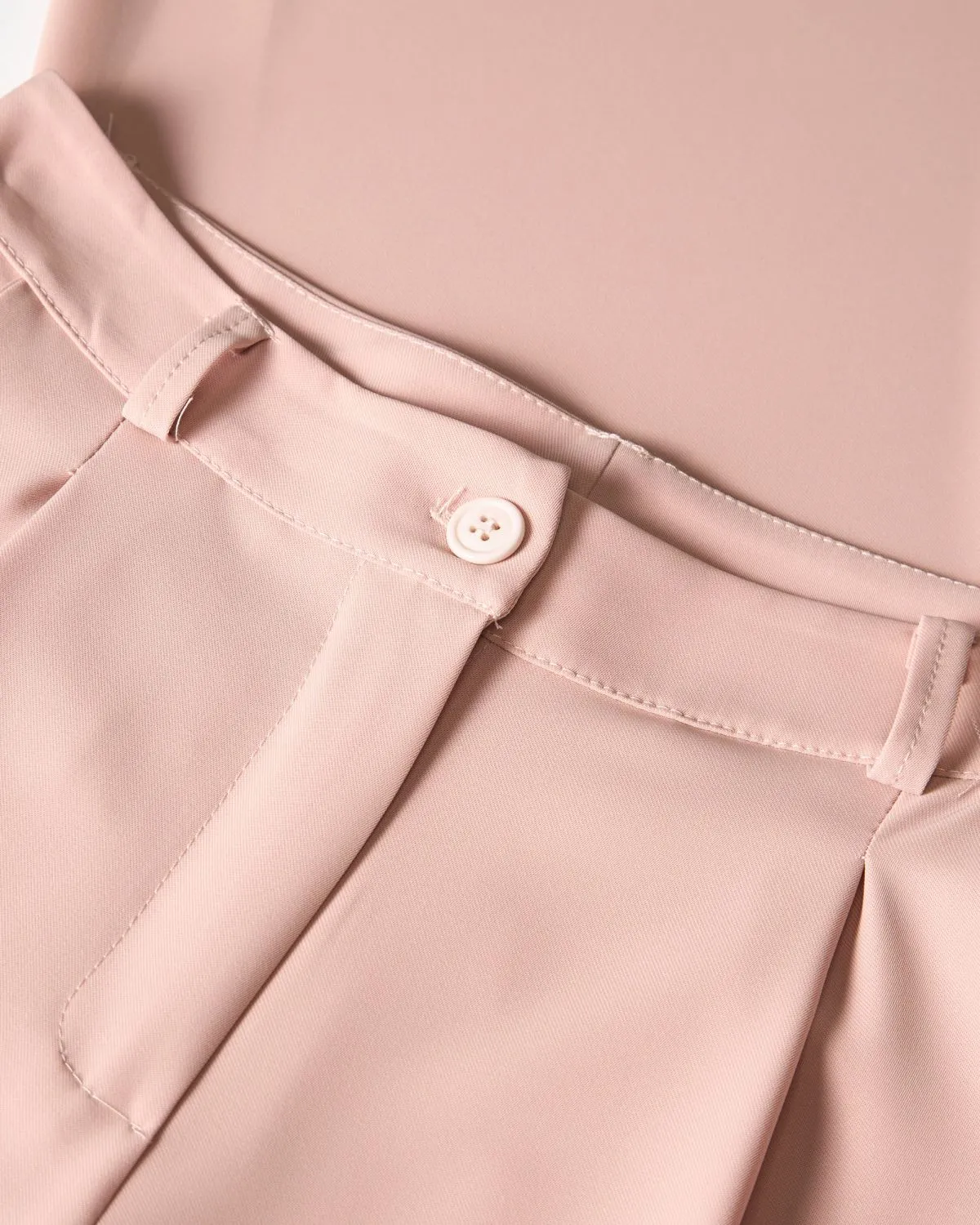 Pantalone Flash a palazzo con piences di colore rosa