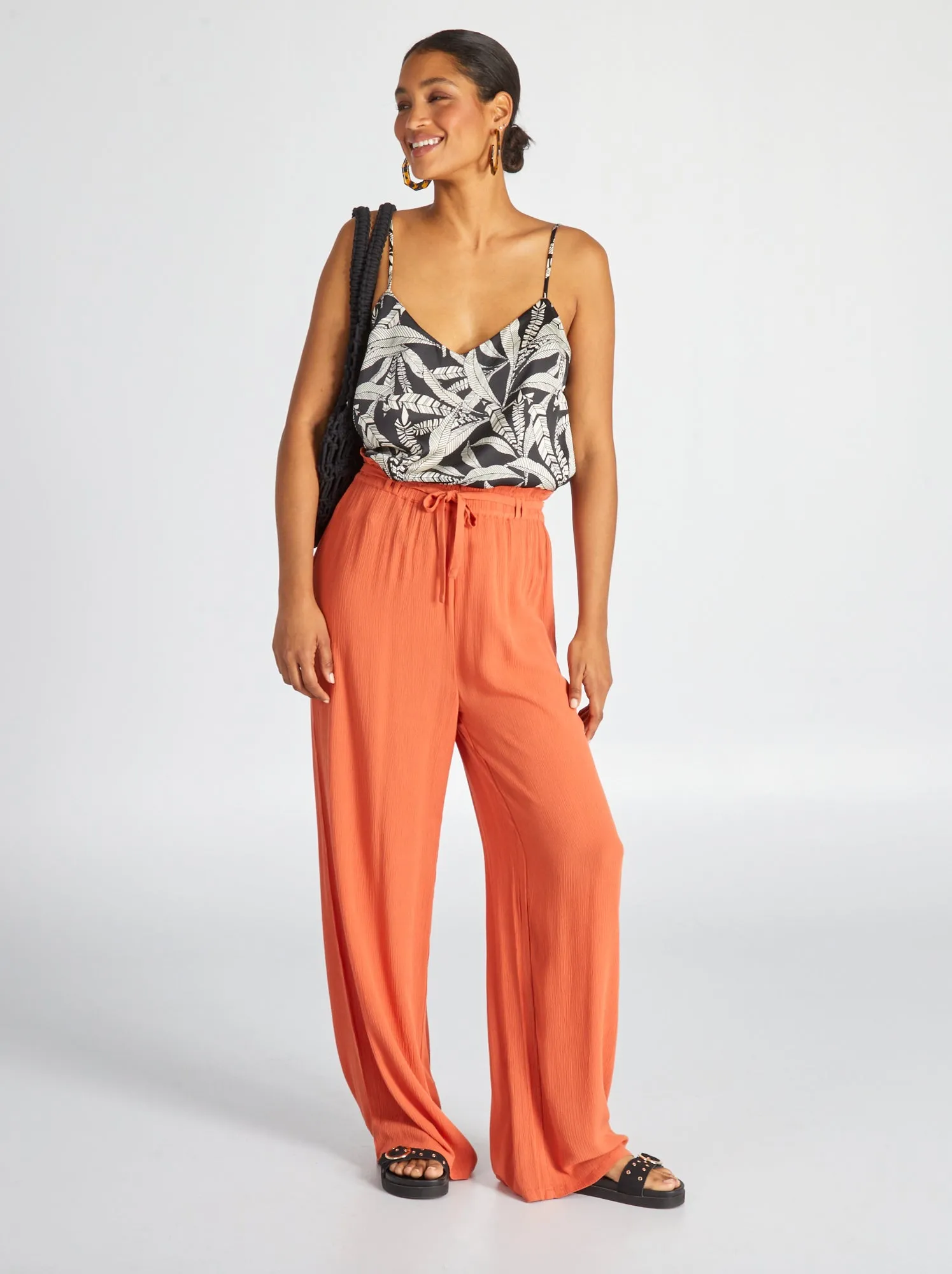 Pantaloni loose fit in tessuto effetto crêpe - arancio