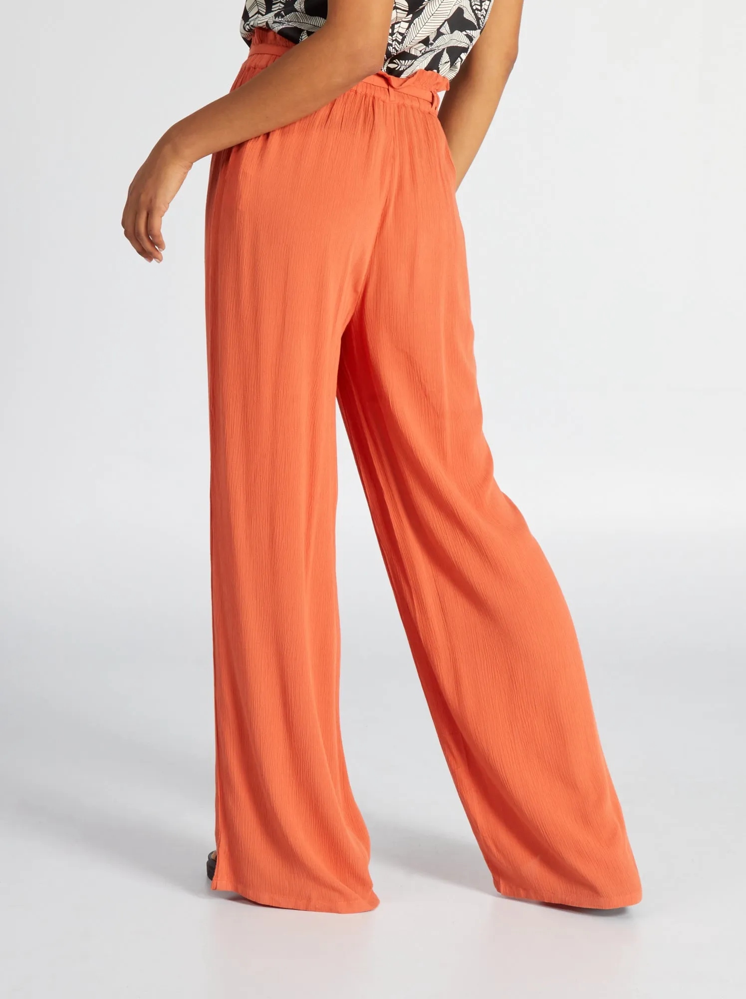 Pantaloni loose fit in tessuto effetto crêpe - arancio